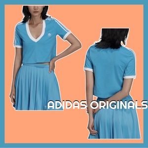 Women's V-Neck Cropped T-Shirt Blue Adidas Top. Accent color- White. Size Xs.
